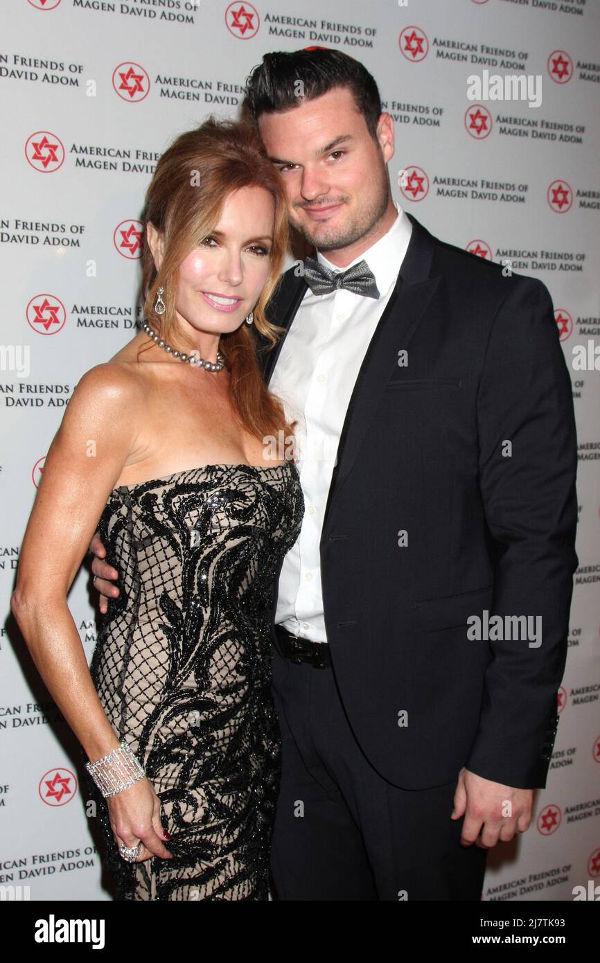 LOS ANGELES - OCT 23:  Tracey Bregman, Austin Recht at the American Friends of Magen David Adom’s Red Star Ball at Beverly Hilton Hotel on October 23, 2014 in Beverly Hills, CA Stock Photo