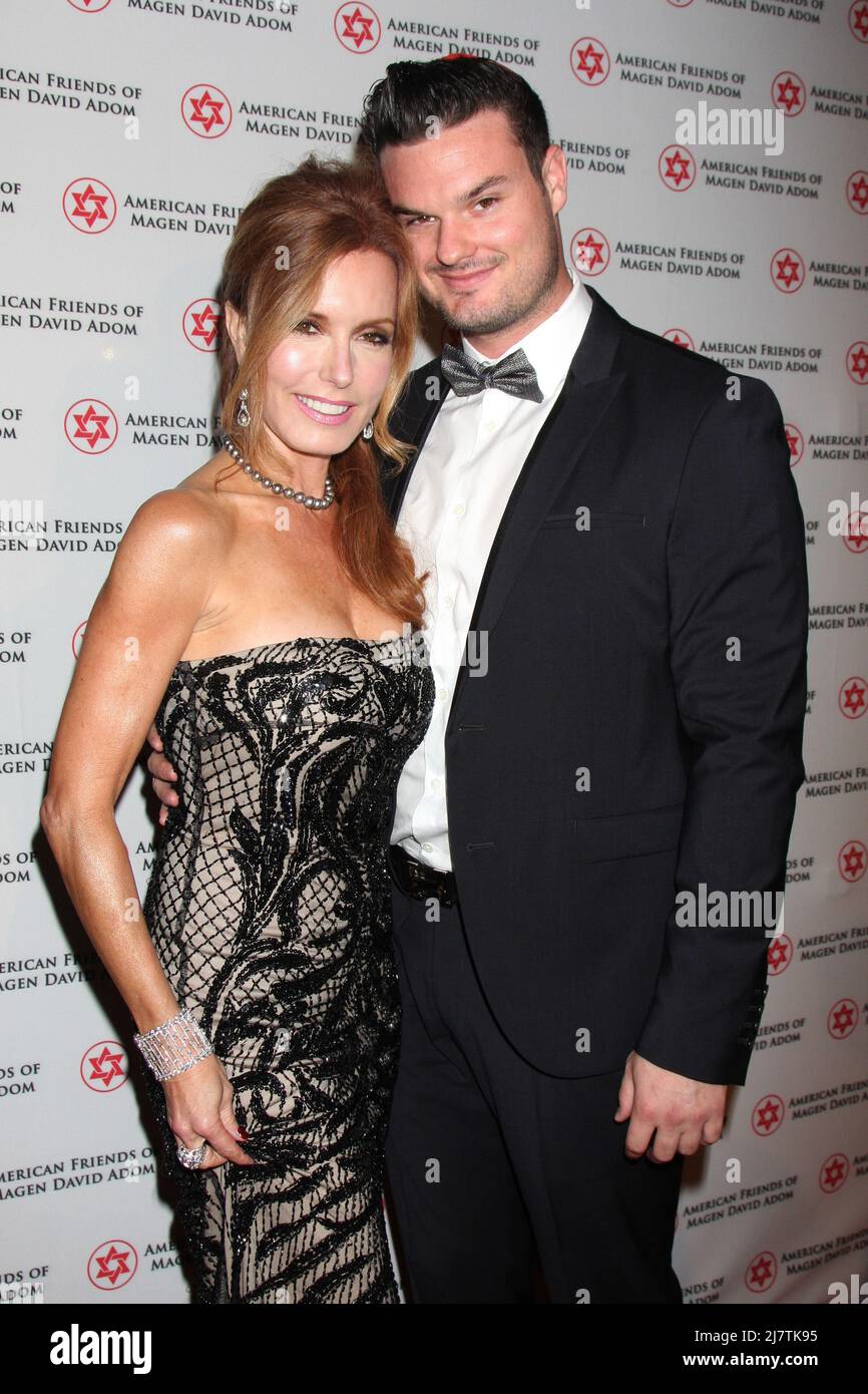 LOS ANGELES - OCT 23:  Tracey Bregman, Austin Recht at the American Friends of Magen David Adom’s Red Star Ball at Beverly Hilton Hotel on October 23, 2014 in Beverly Hills, CA Stock Photo