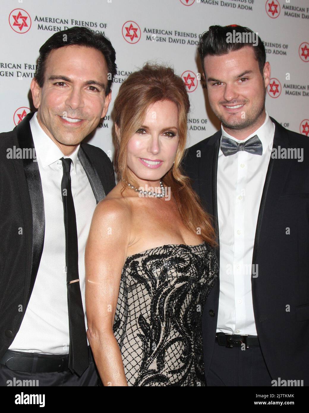 LOS ANGELES - OCT 23:  William Dorfman, Tracey Bregman, Austin Recht at the American Friends of Magen David Adom’s Red Star Ball at Beverly Hilton Hotel on October 23, 2014 in Beverly Hills, CA Stock Photo