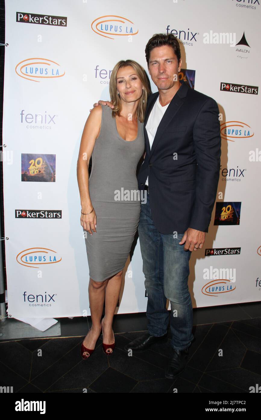 LOS ANGELES - SEP 18:  Sandra Hess, Michael Trucco at the ‘Get Lucky for Lupus’ Poker Tournament at Avalon Hollywood on September 18, 2014 in Los Angeles, CA Stock Photo