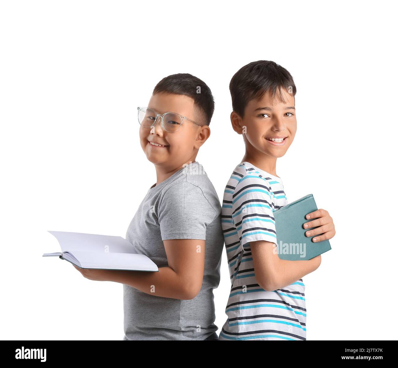 Little boys with books on white background Stock Photo - Alamy