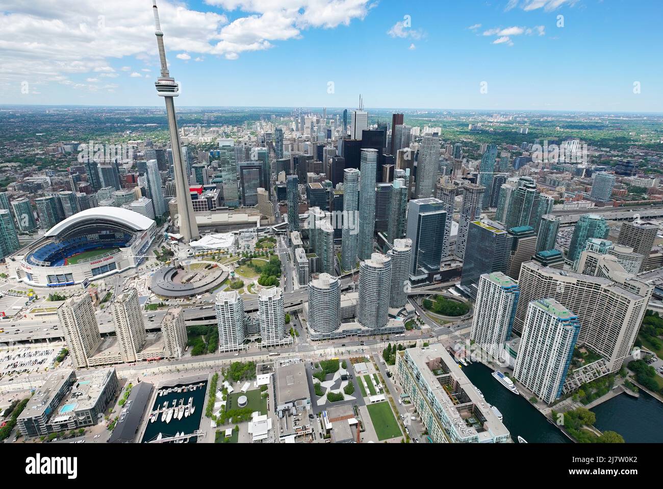 The CN Tower and the Roger centre during the day Stock Photo