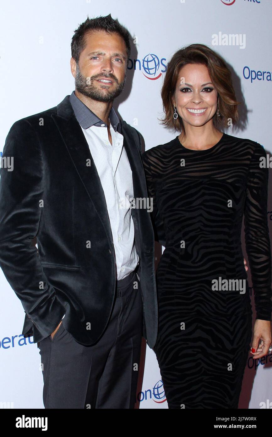LOS ANGELES - SEP 19:  David Charvet, Brooke Burke-Charvet at the Operation Smile Gala 2014 at Beverly Wilshire Hotel on September 19, 2014 in Beverly Hills, CA Stock Photo