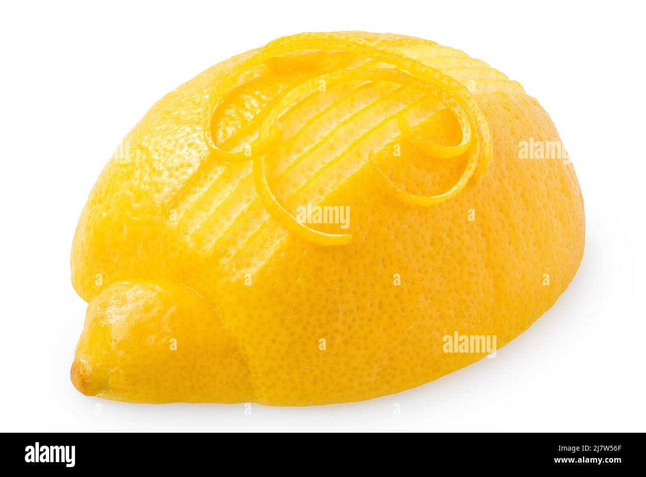 Partially peeled half of lemon with strips of lemon zest on top isolated on white. Stock Photo