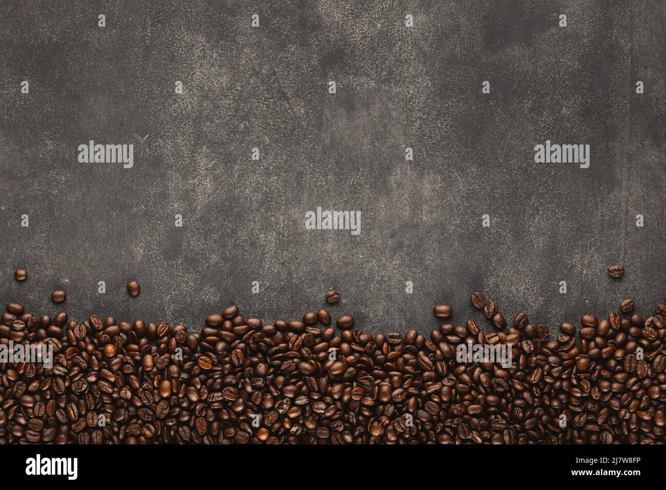 Roasted coffee bean frame on dark grey rough background Stock Photo - Alamy