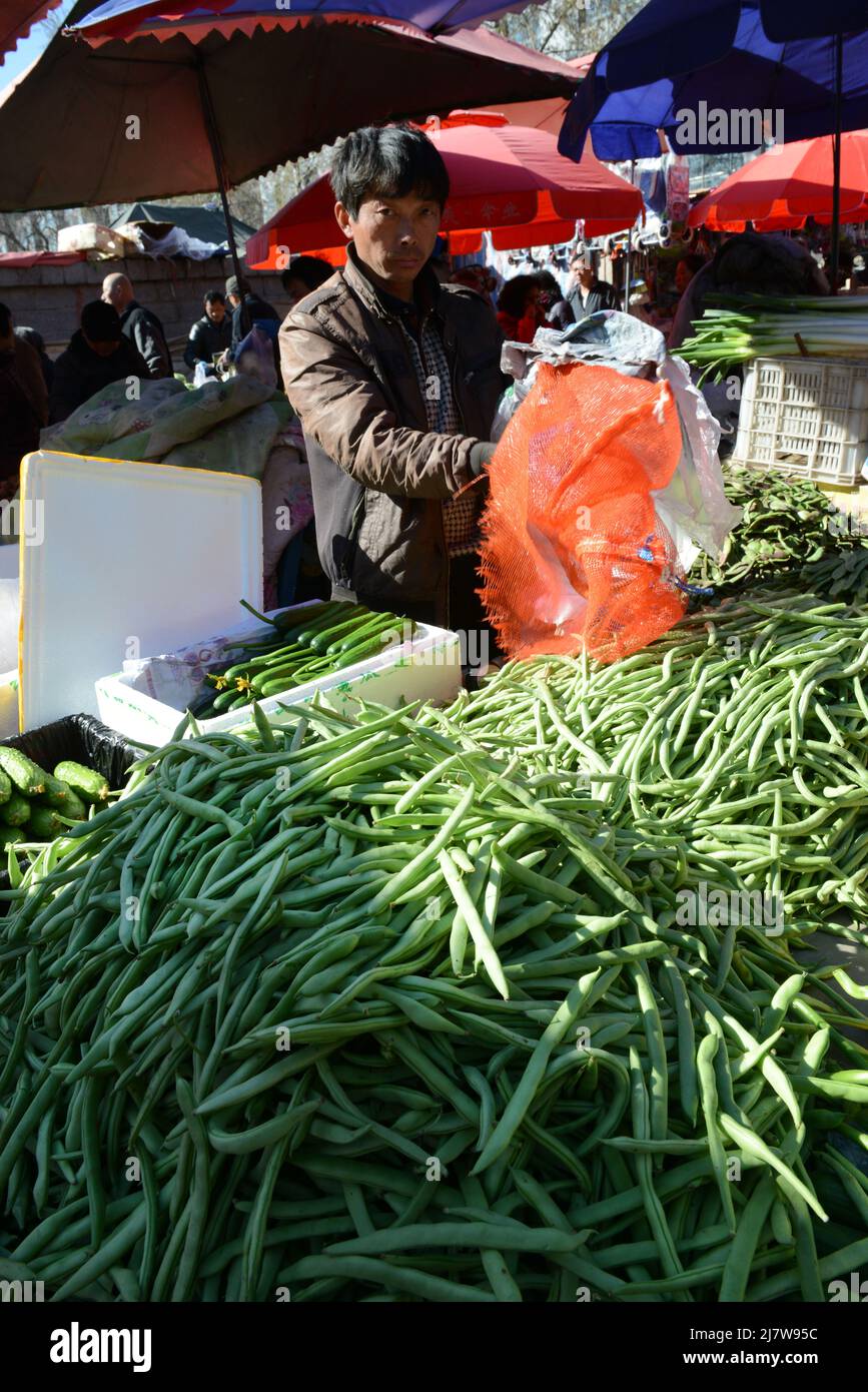 A large colorful fresh produce market in chaoyangmen, Beijing, China. Stock Photo