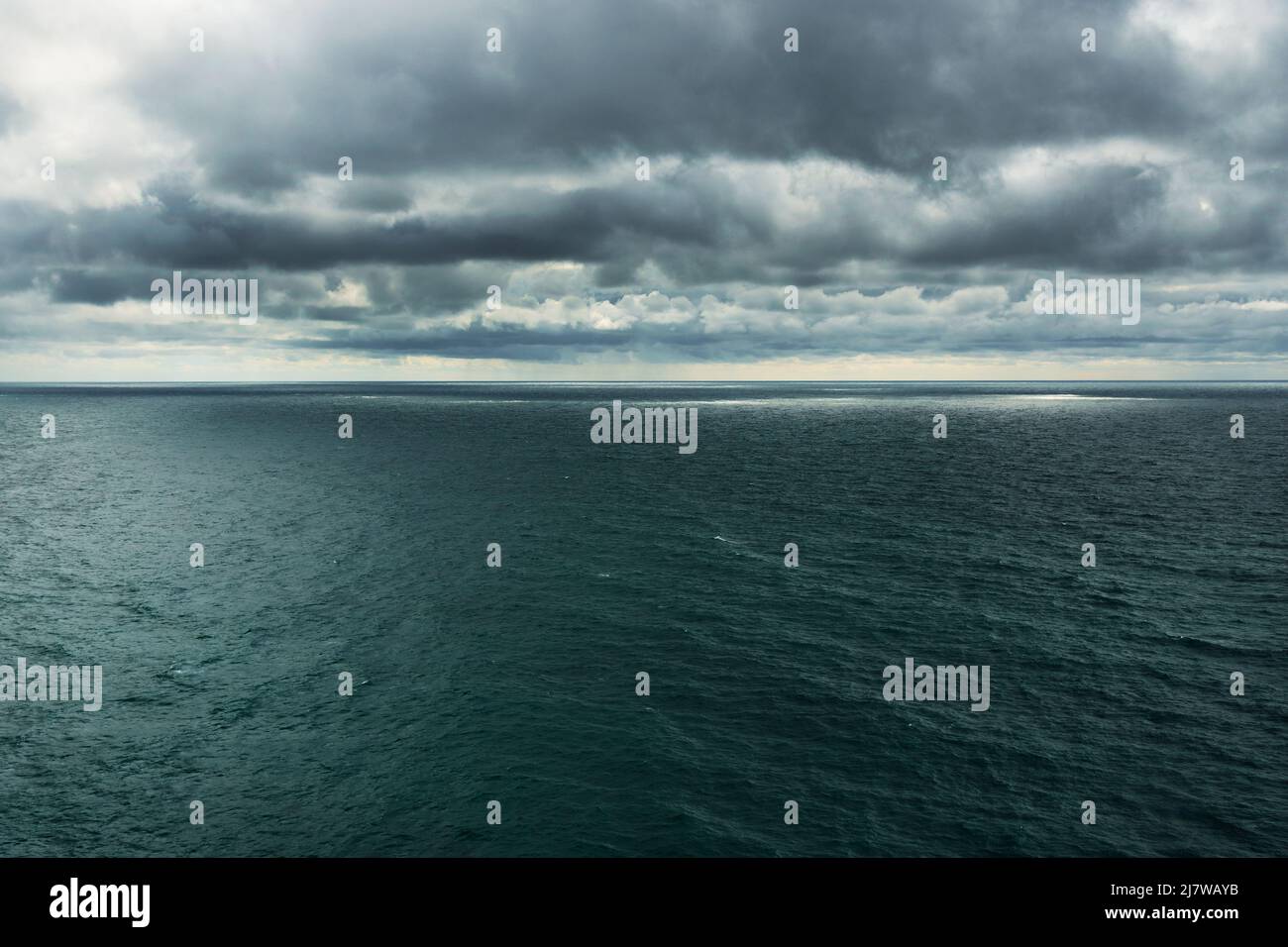 Dramatic dark clouds over the sea before the rain. background Stock ...
