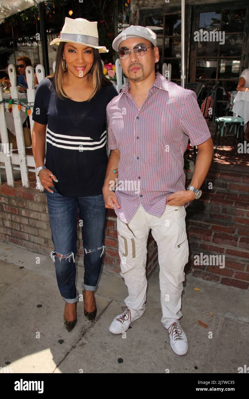 LOS ANGELES JUL 28 Arthel Neville, Taku Hirano at the The Ivy on