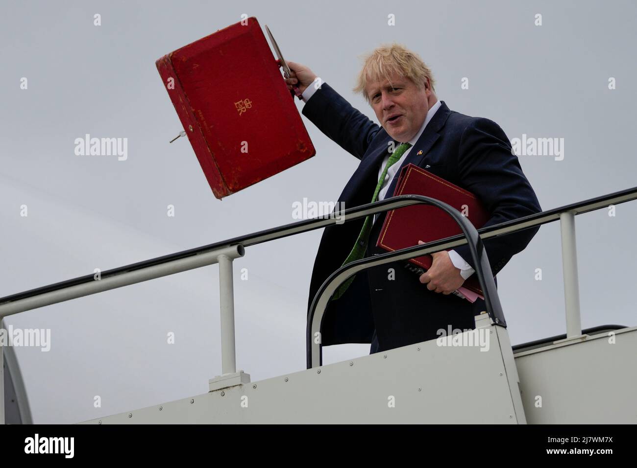 British Prime Minister Boris Johnson reacts as he boards a plane to visit Sweden and Finland, at London Stansted Airport, Britain, May 11, 2022. Frank Augstein/Pool via REUTERS Stock Photo