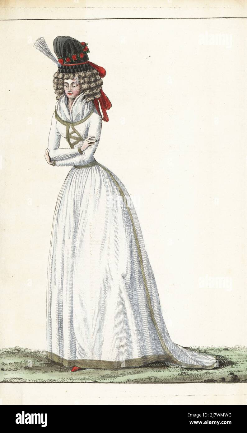 Fashionable woman or Religieuse new to society, in linen gown a la Vestale decorated with galon d'or, gauze fichu, hairstyle with five rows of curls a la passion, chignon, black gauze pouf bonnet with aigrette and knot of nakara ribbons. Handcoloured copperplate engraving from Jean-Antoine le Brun or Lebrun-Tossa’s Journal de la Mode et du Gout, previously Cabinet des Modes, Chez Buisson, Paris, and Joseph le Boffe, London, 4me Cahier, 25 March 1790. Stock Photo