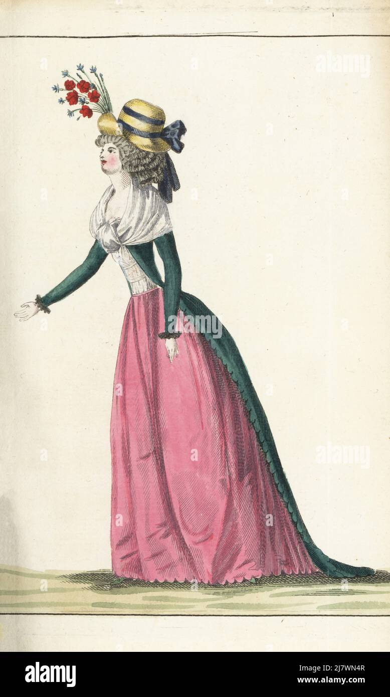 Woman in straw hat with violet ribbons, hair in curls, green taffeta gown, white gauze fichu tied in front, pink taffeta petticoat. Handcoloured copperplate engraving from Jean-Antoine le Brun or Lebrun-Tossa’s Journal de la Mode et du Gout, previously Cabinet des Modes, Chez Buisson, Paris, and Joseph le Boffe, London, 17me Cahier, 5 August 1790. Stock Photo