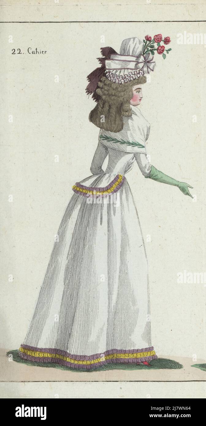 Woman in bonnet a la Citoyenne, hair in ringlets, white caraco and petticoat decorated with yellow and violet pleated ribbons, fichu bordered with green leaves. Handcoloured copperplate engraving from Jean-Antoine le Brun or Lebrun-Tossa’s Journal de la Mode et du Gout, previously Cabinet des Modes, Chez Buisson, Paris, and Joseph le Boffe, London, 22me Cahier, 25 September 1790. Stock Photo