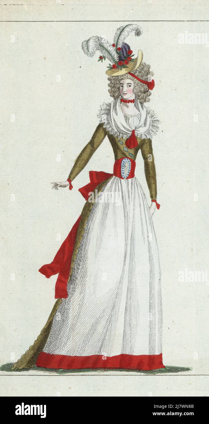 Woman in straw bonnet decorated with pomegranate flowers, aigrette and cockade, hair in ringlets, red ribbon choker, lace gauze fichu, lace tucker, silk gown in colour of dead leaves, nakara belt, white petticoat. Handcoloured copperplate engraving from Jean-Antoine le Brun or Lebrun-Tossa’s Journal de la Mode et du Gout, previously Cabinet des Modes, Chez Buisson, Paris, and Joseph le Boffe, London, 26me Cahier, 5 November 1790. Stock Photo