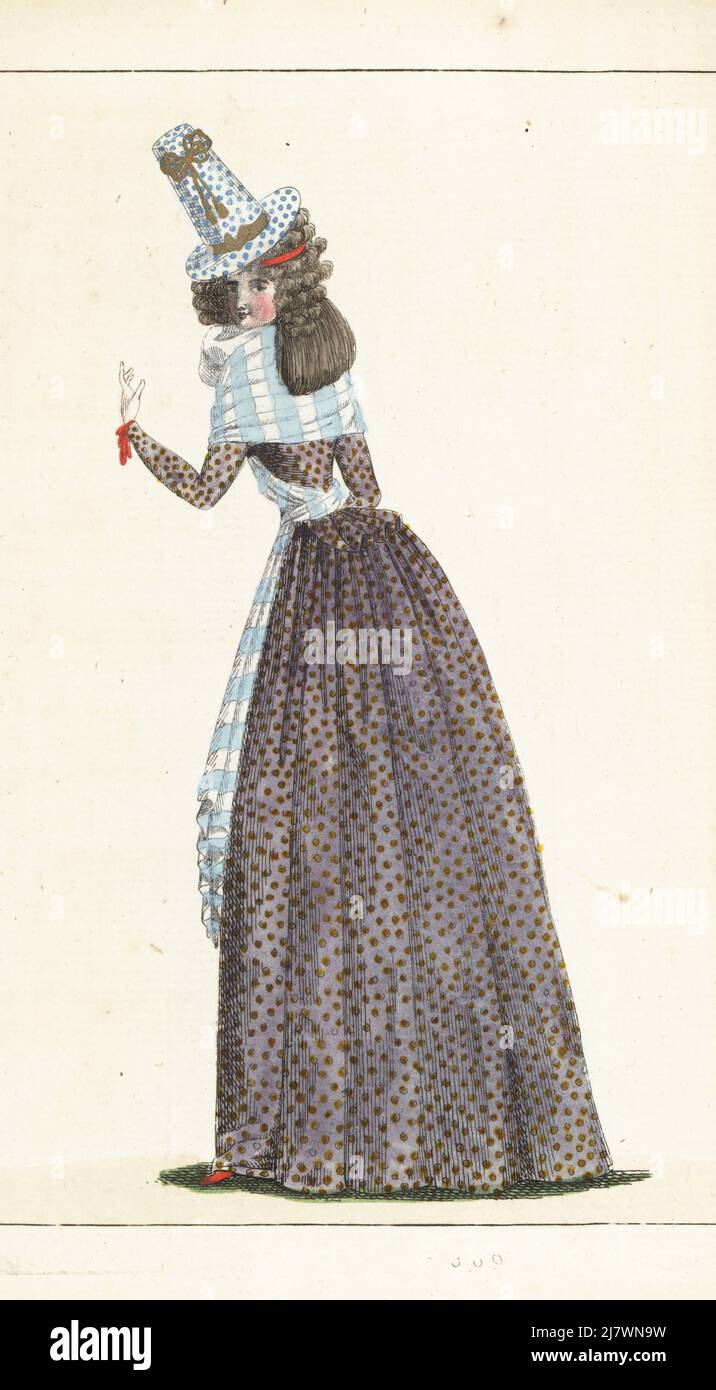 Woman in pointed felt hat with sky-blue dots, gauze fichu, striped shawl, satin caraco and petticoat in violet with yellow dots, red slippers. Handcoloured copperplate engraving from Jean-Antoine le Brun or Lebrun-Tossa’s Journal de la Mode et du Gout, previously Cabinet des Modes, Chez Buisson, Paris, and Joseph le Boffe, London, 31me Cahier, 25 December 1790. Stock Photo