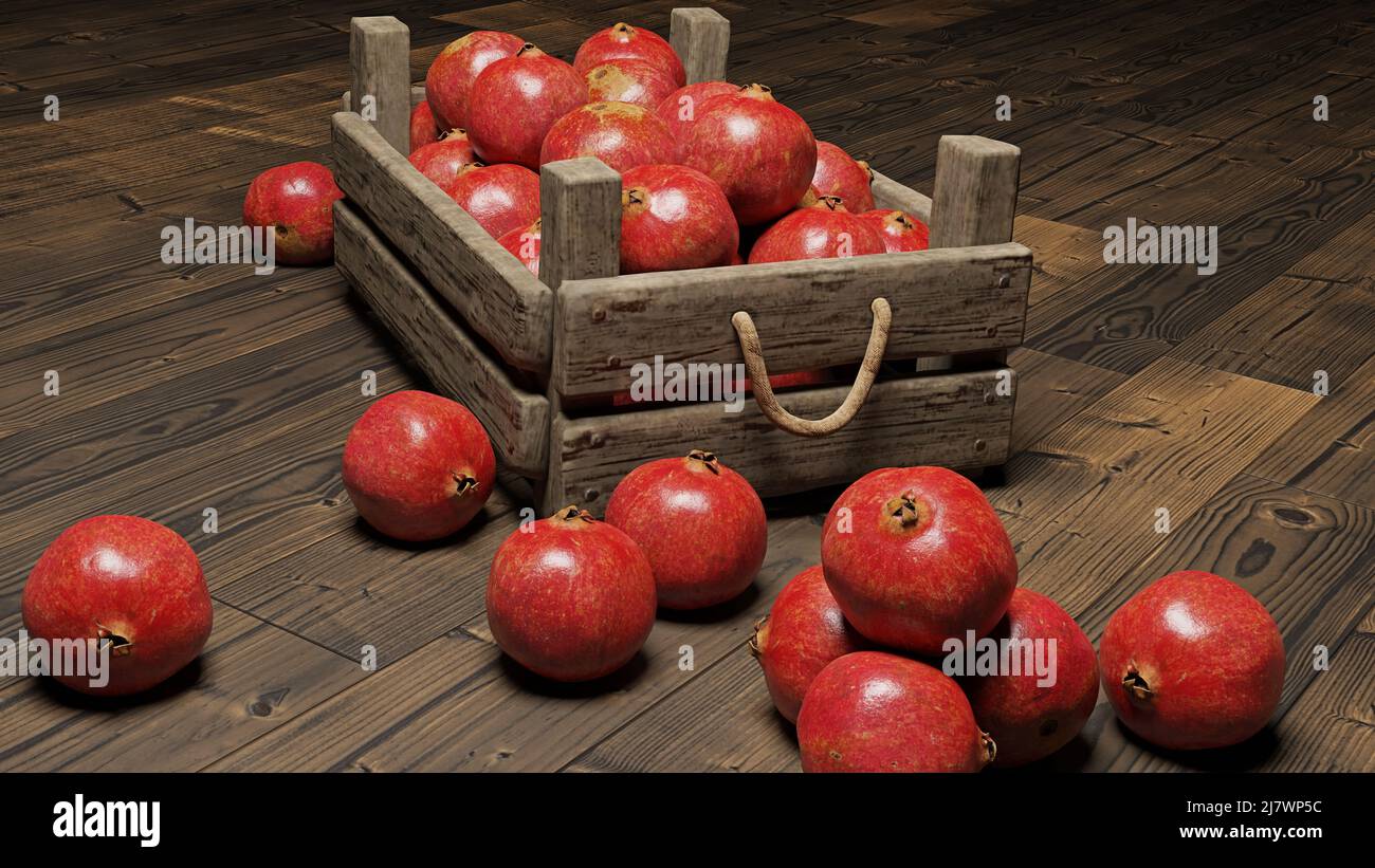 pomegranates, juicy fruits in a crate on wooden background Stock Photo