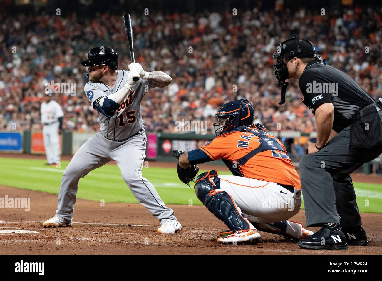 Detroit Tigers catcher Tucker Barnhart (15) hits a sacrifice ground out to first, scoring Detroit Tigers first baseman Harold Castro (30) from thrid i Stock Photo