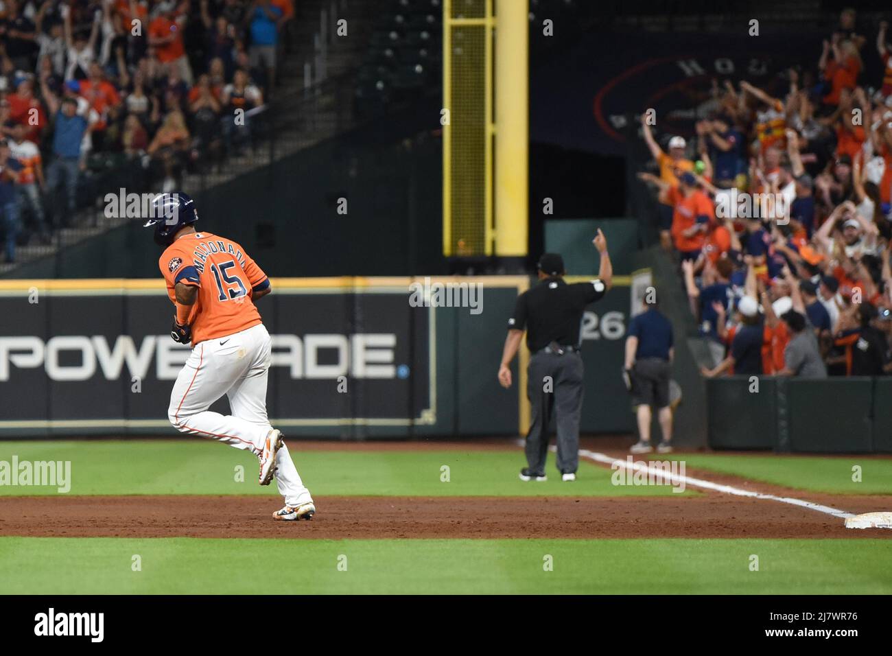 Houston Astros catcher Martin Maldonado (15) circles the baes after hitting a home run in the bottom of the second inning during the MLB game between Stock Photo