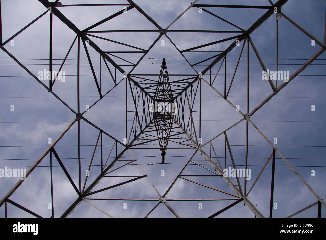Power line tower with blue sky Stock Photo - Alamy