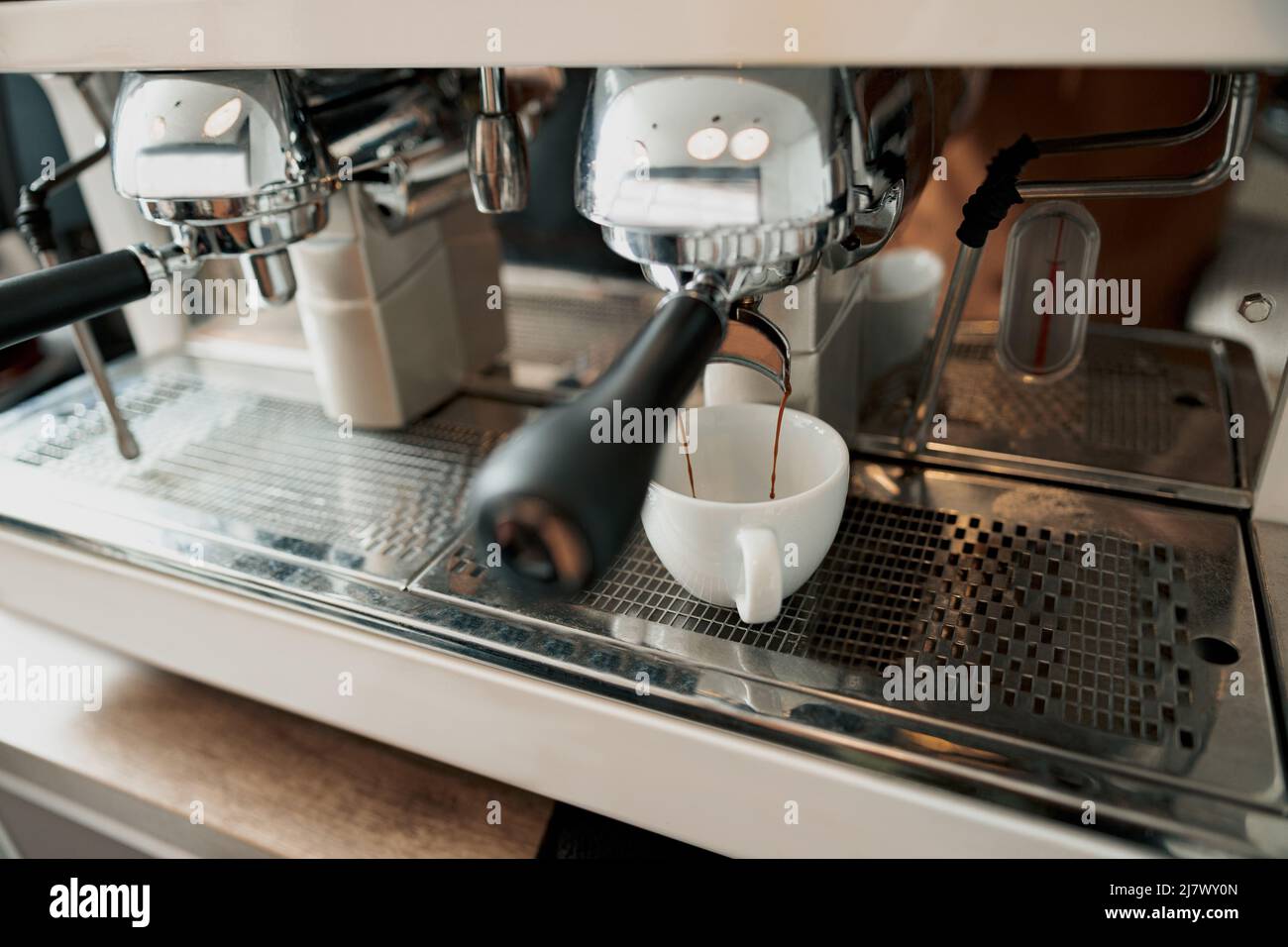Professional coffee machine brewing coffee in cafeteria Stock Photo Alamy