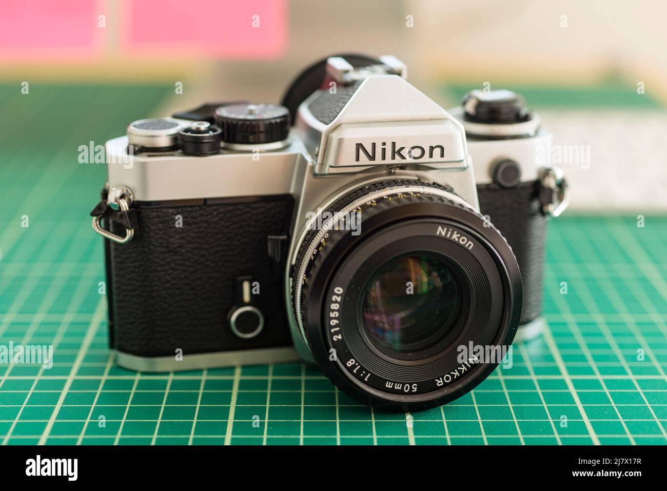 Nikon FE SLR with 50mm lens attached Stock Photo