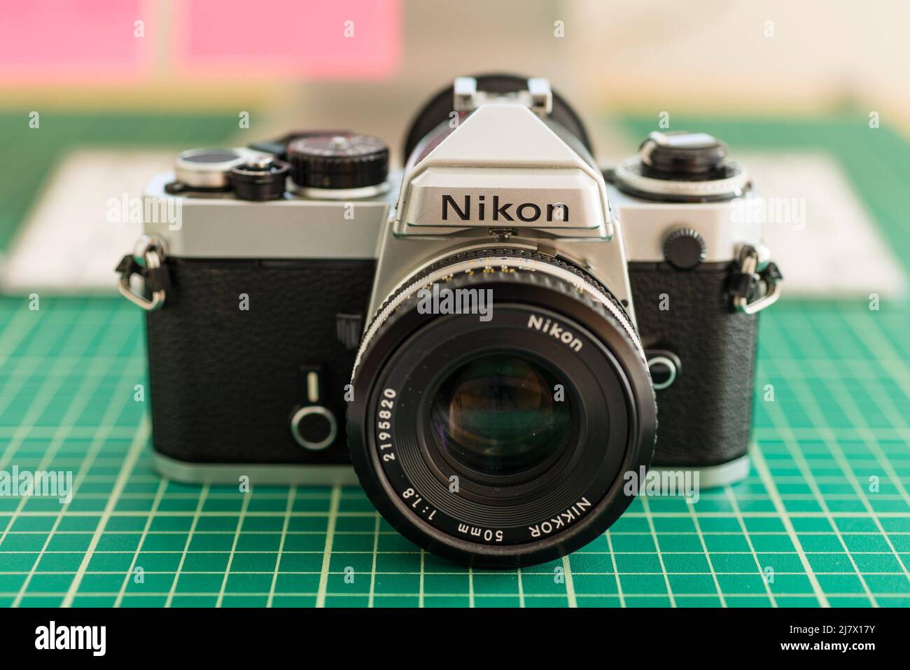 Nikon FE SLR with 50mm lens attached Stock Photo