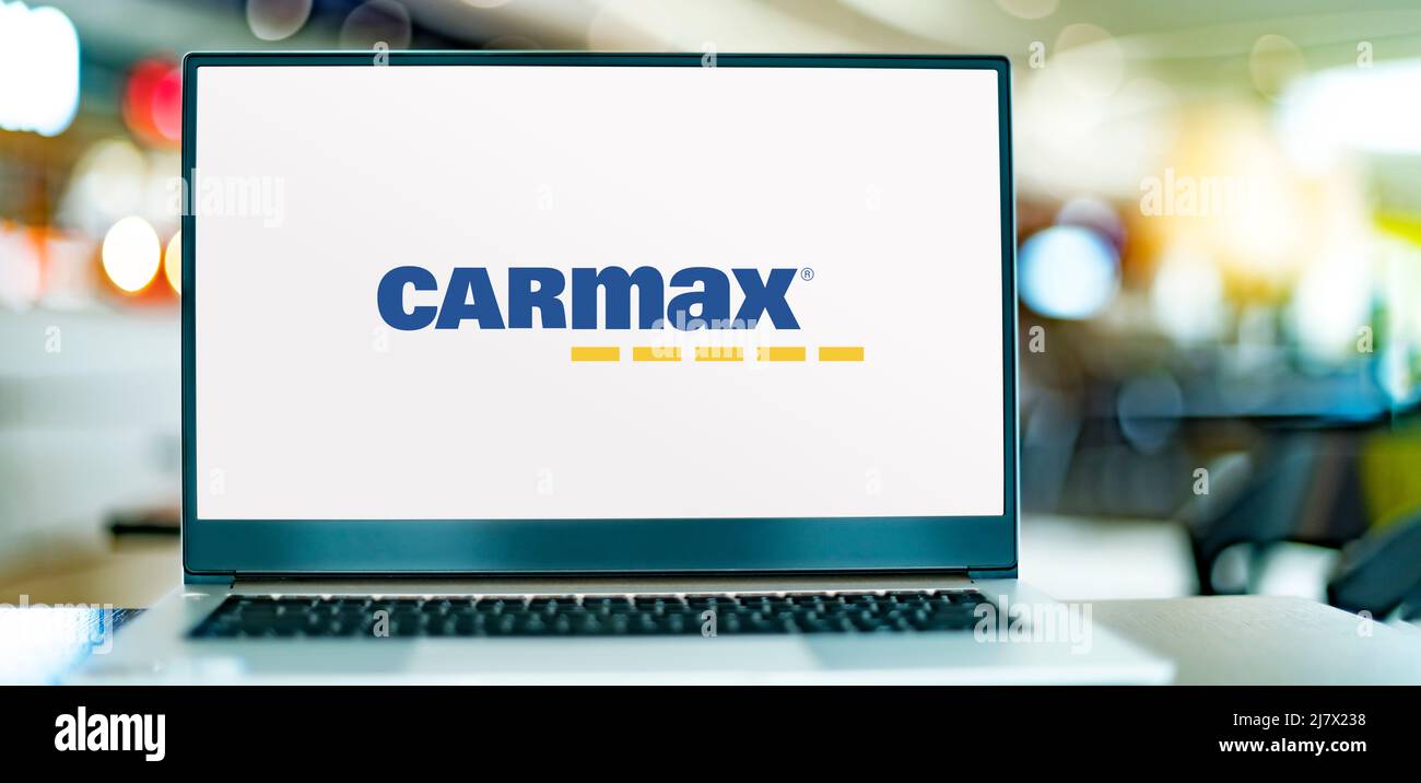 POZNAN, POL - FEB 25, 2022: Laptop computer displaying logo of CarMax ...