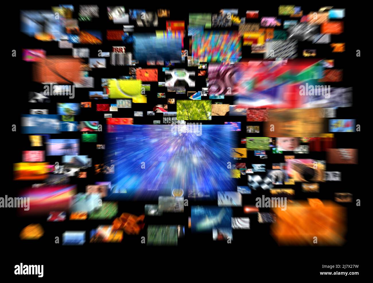 Multiple screens to infinity. Broadcast, Information worm hole, Streaming Multiple screens showing a mosaic of hundreds of images. Streaming Televisio Stock Photo