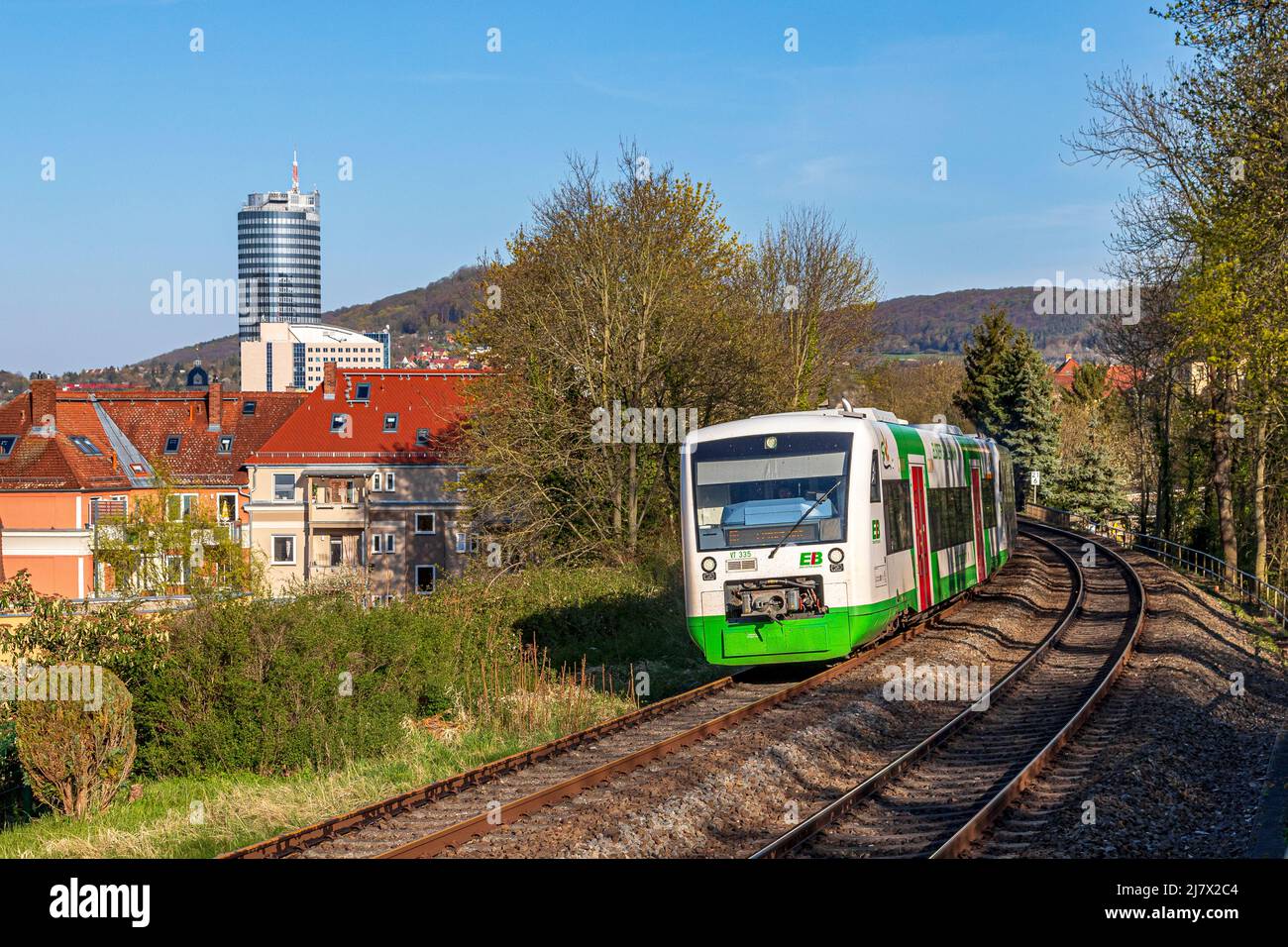Railcars Of The Erfurter Bahn In Jena With The Jentower In The Background, Thuringia, Germany, Europe Stock Photo