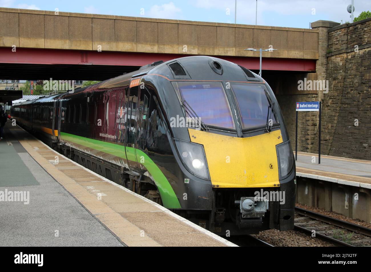 Grand Central Adelante dhmu, Bradford Interchange station. Lead car has inscription World's First Dual Fuel LNG Powered Passenger train on side of car. Stock Photo