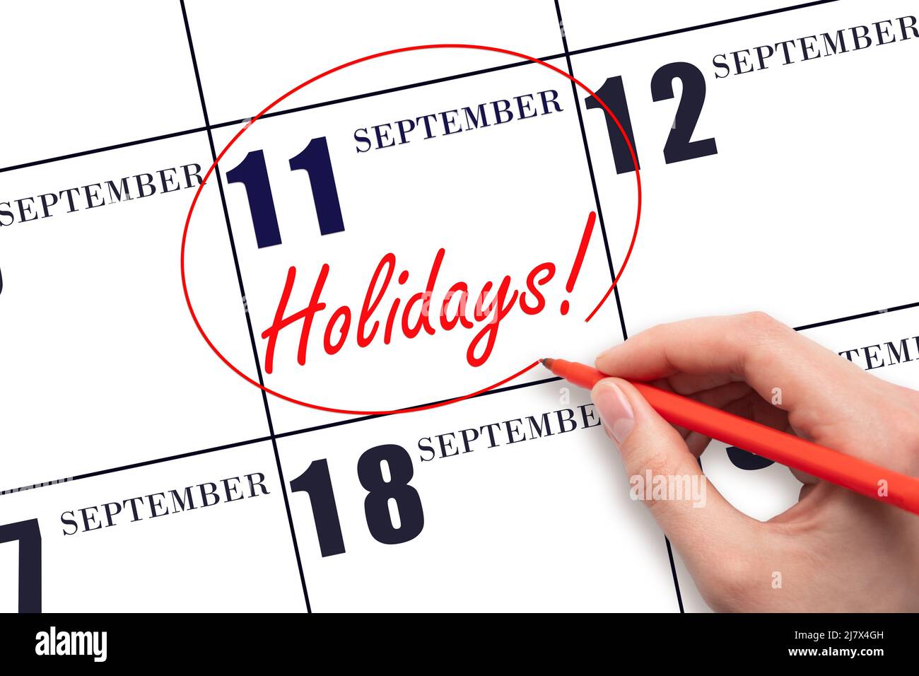 11th day of September. Hand drawing a red circle and writing the text  Holidays on the calendar date 11 September . Important date. Autumn month,  day o Stock Photo - Alamy