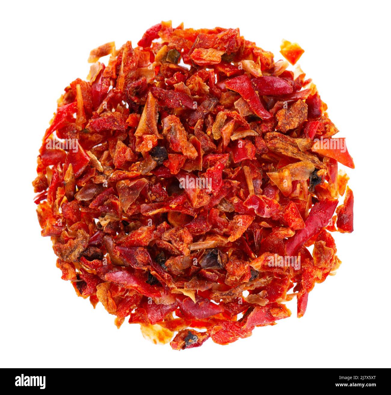 Dried red paprika flakes isolated on white background. Spices and herbs
