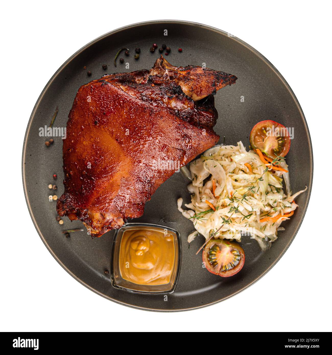 Isolated portion of pork knuckle with sauerkraut Stock Photo Alamy