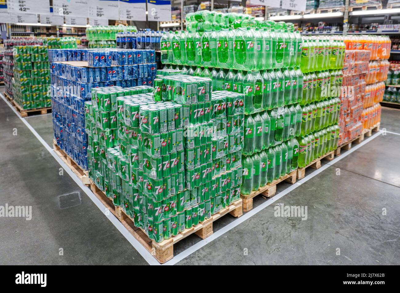 Samara, Russia - May 5, 2022: Bottled and canned nonalcoholic Pepsi Cola and 7up beverages at the superstore Stock Photo