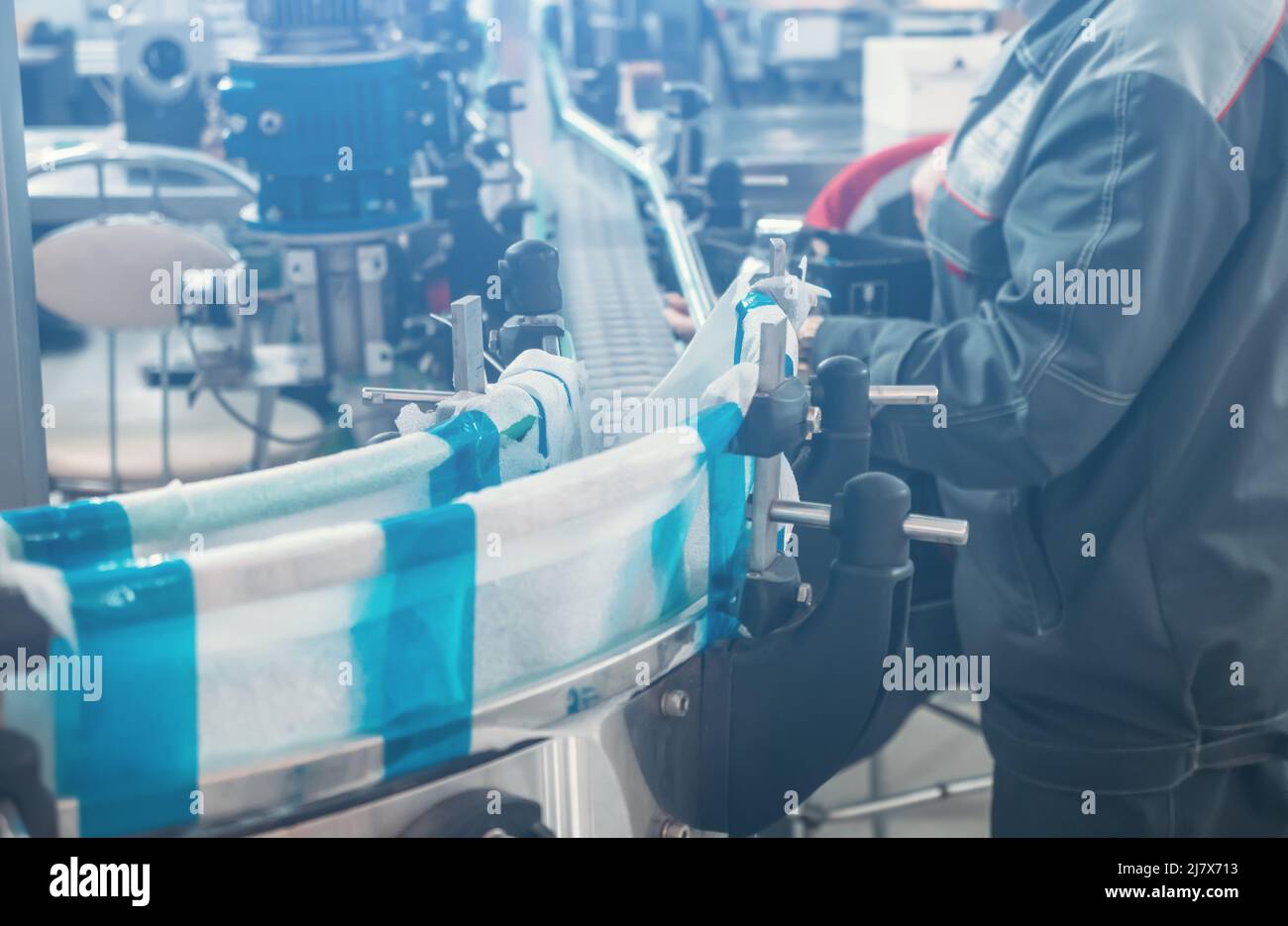 Conveyor line or production line in wine or beverage factory close up. Stock Photo