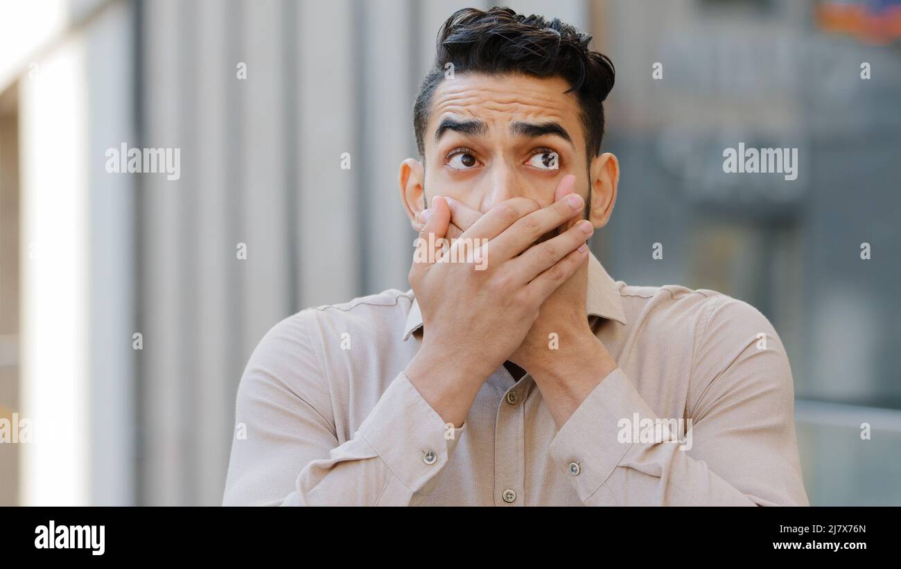 Man scared hands face hi-res stock photography and images - Alamy