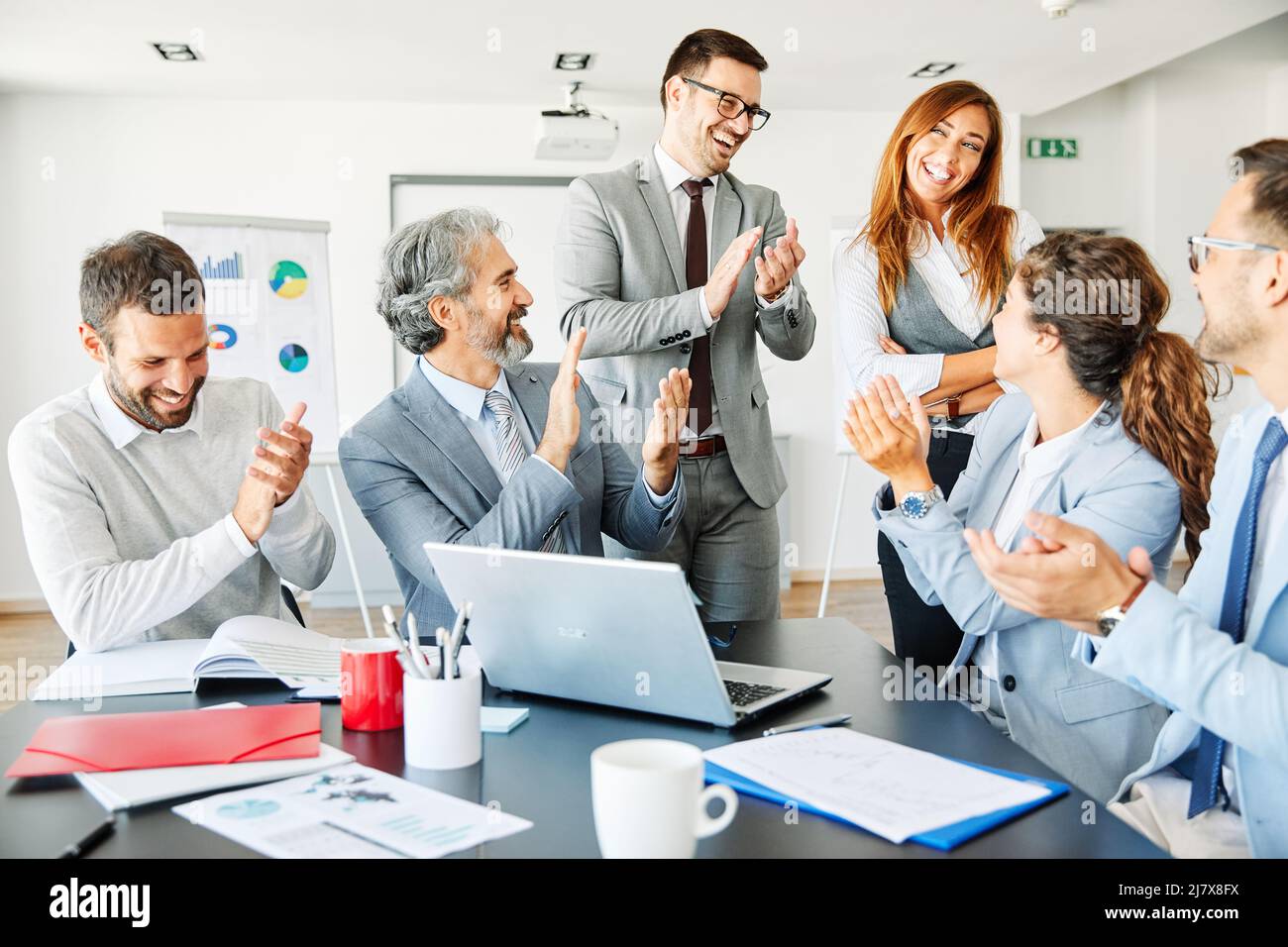 business meeting applauding clapping support congratulation office conference team teamwork Stock Photo