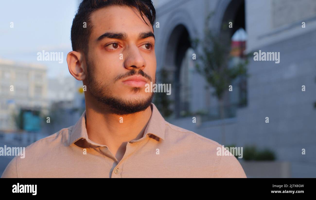 Arab young man looking away hi-res stock photography and images - Alamy