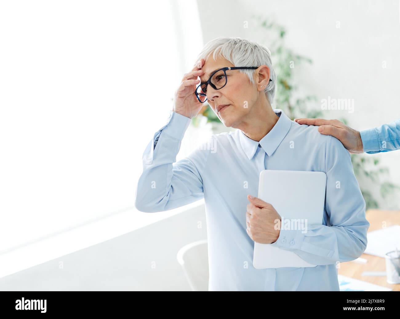 senior business woman office corporate stress problem headache work overworked businesswoman tired Stock Photo