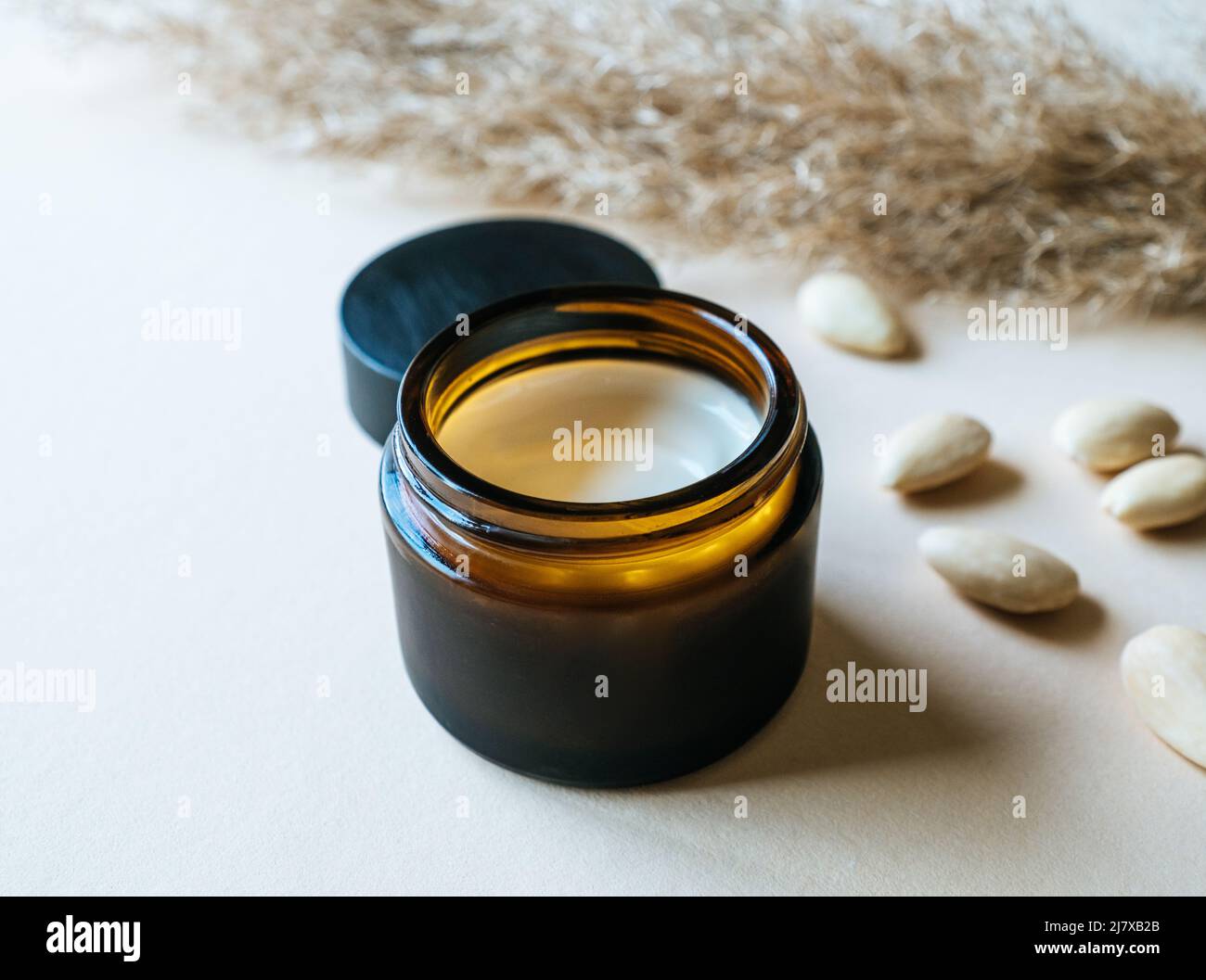 DIY homemade sustainable natural cosmetics skincare face creme with almond oil Stock Photo