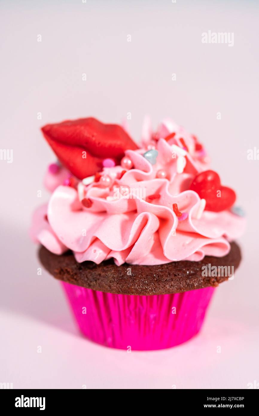 Red velvet cupcakes with pink Italian buttercream frosting and ...