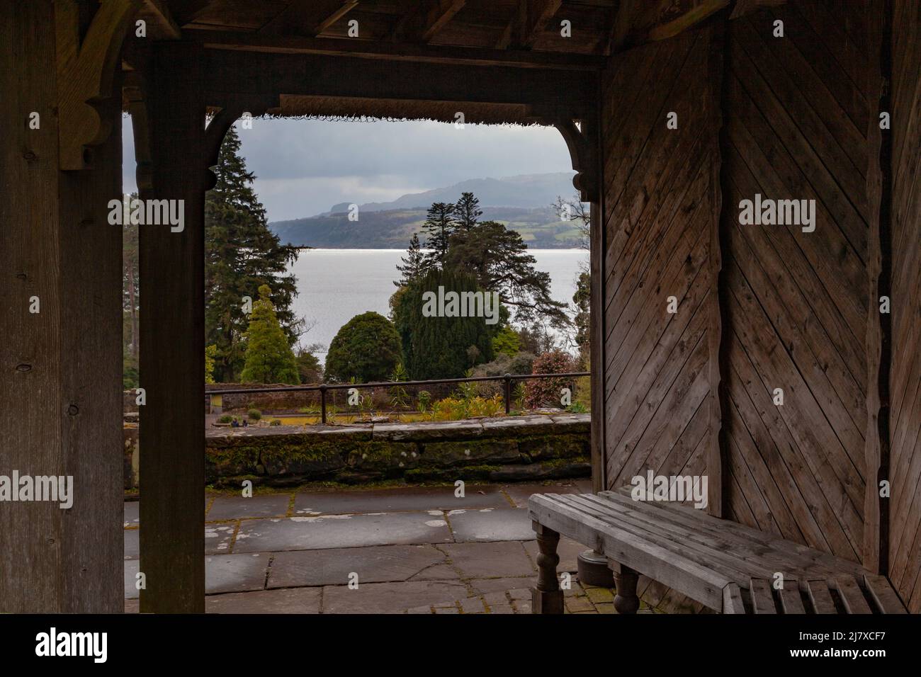 Brodick Castle, Isle of Arran, Ayrshire, Scotland - a view of the Firth of Clyde through the veranda of the Heather House Pavilion Stock Photo