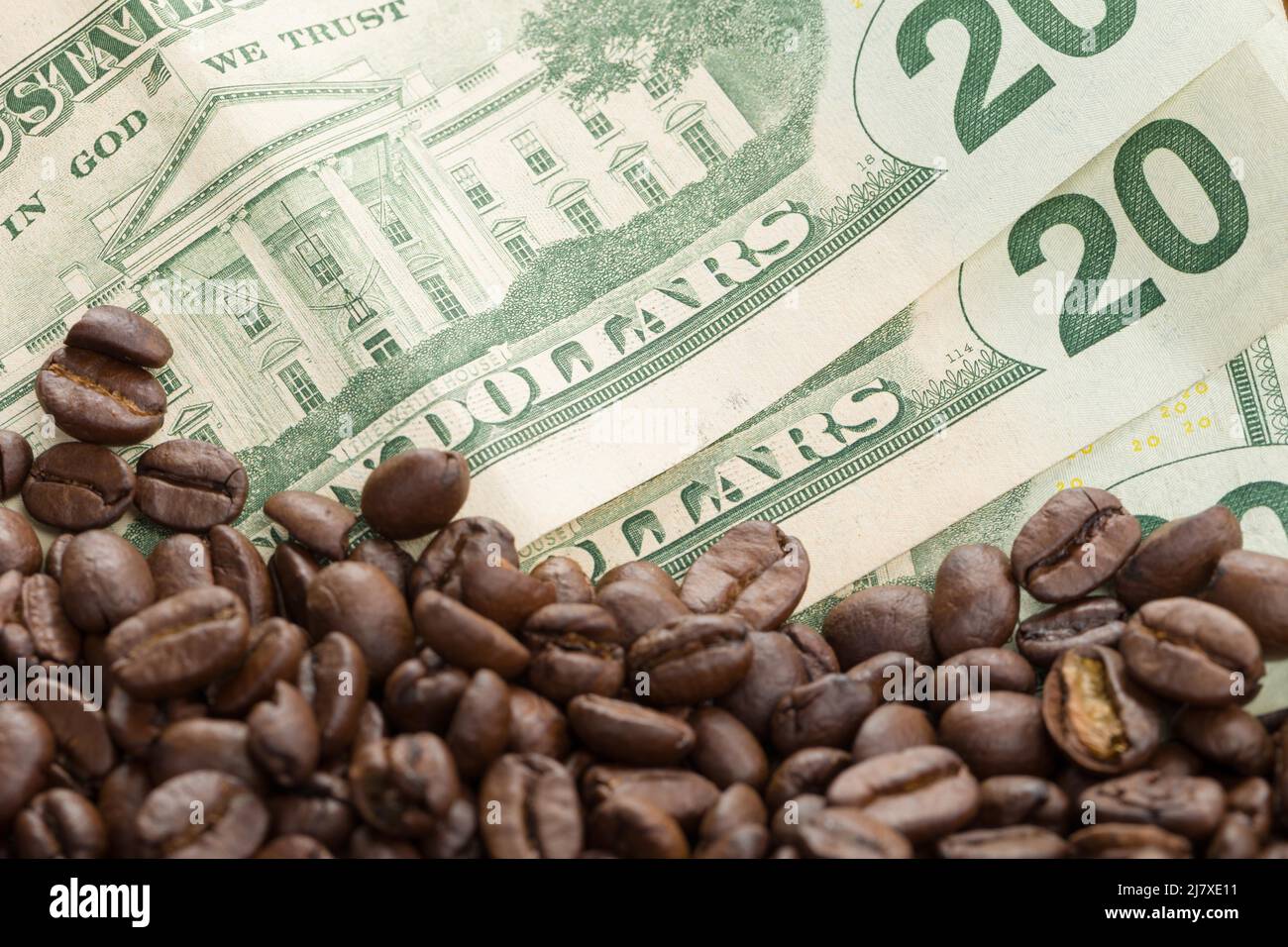increasing coffee prices symbolic picture of coffee beans and dollar