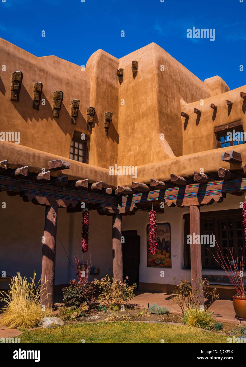 courtyard of historic Adobe Pueblo building housing the New Mexico Museum of Art in Santa Fe, New Mexico Stock Photo