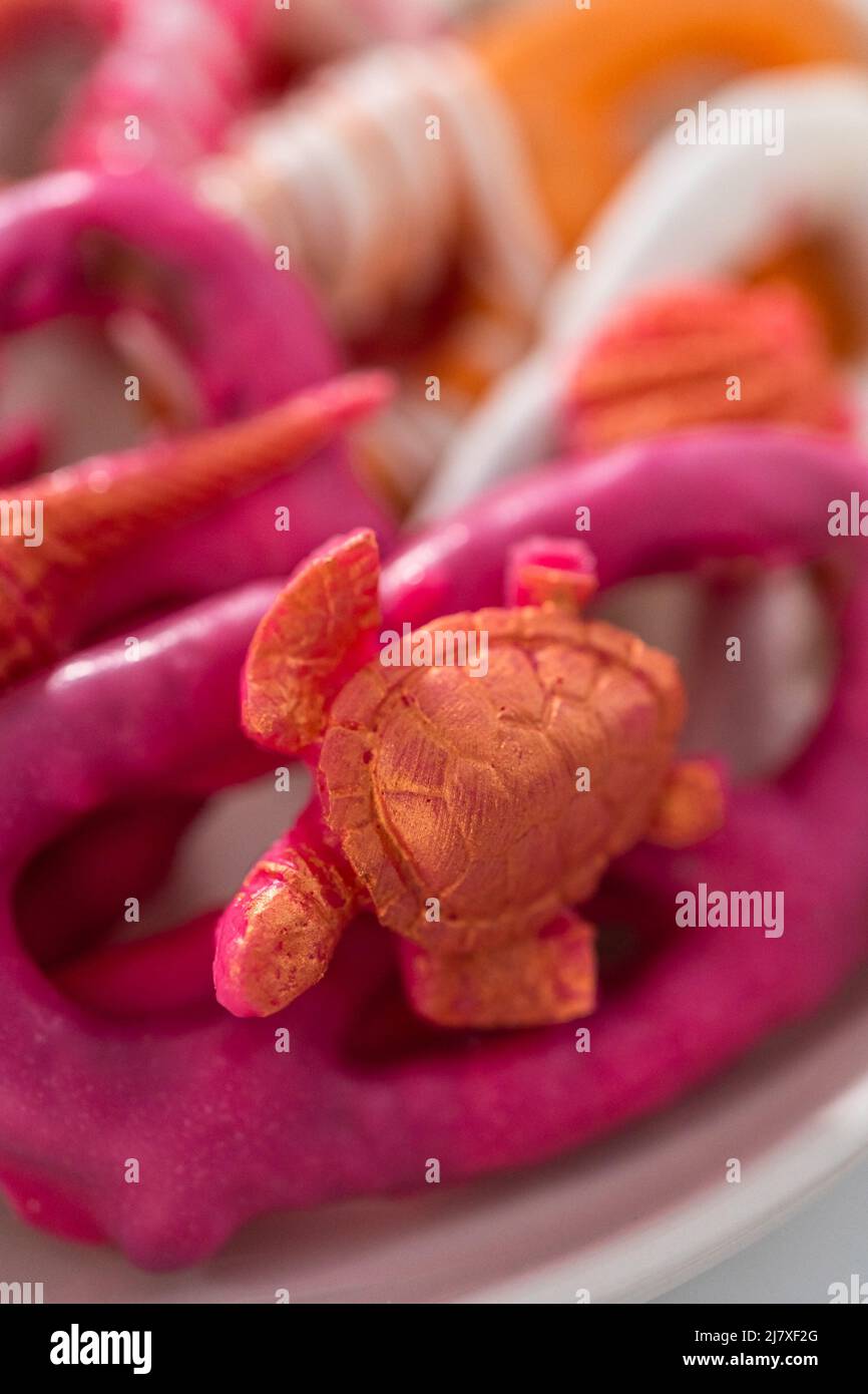 Gourmet chocolatecovered pretzel twists with seashellshaped