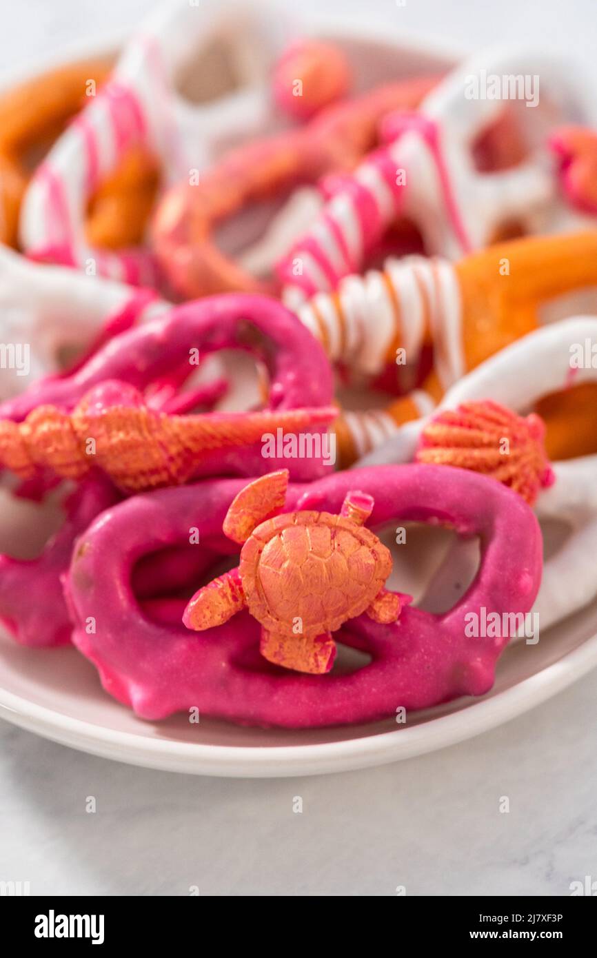 Gourmet chocolatecovered pretzel twists with seashellshaped