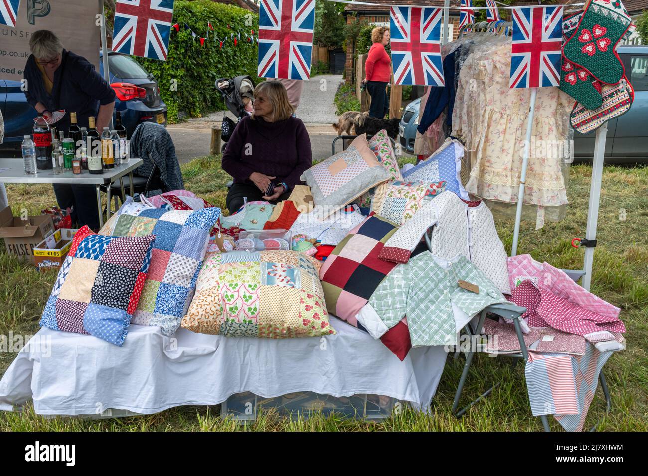 Dunsfold village fete, Surrey, England, UK. Stalls with handicrafts and bottles Stock Photo