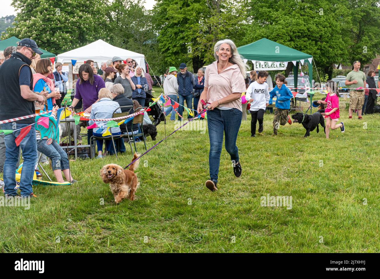 Dunsfold village fete, Surrey, England, UK, with a dog show in the arena. Stock Photo