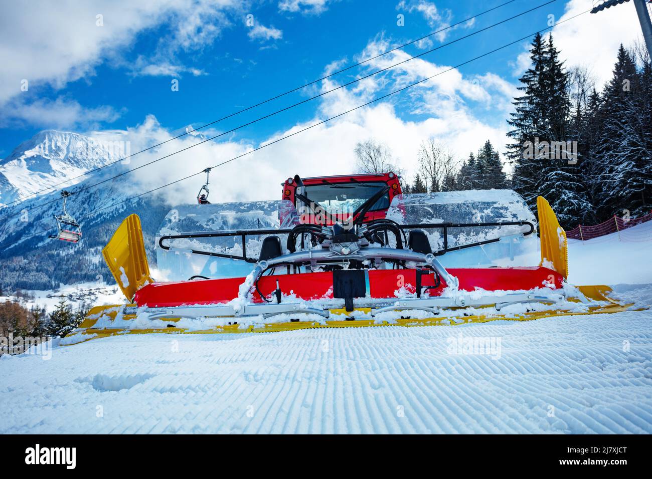 Snowcat ratrack machine making snow at ski resort Stock Photo