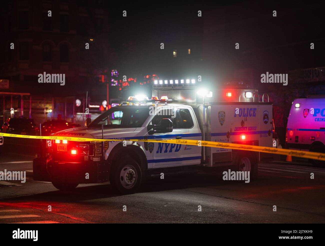 Police are investigating the scene where two police officers from the 42nd Precinct exchanged