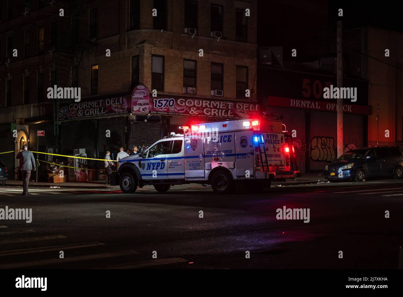 Police are investigating the scene where two police officers from the 42nd Precinct exchanged